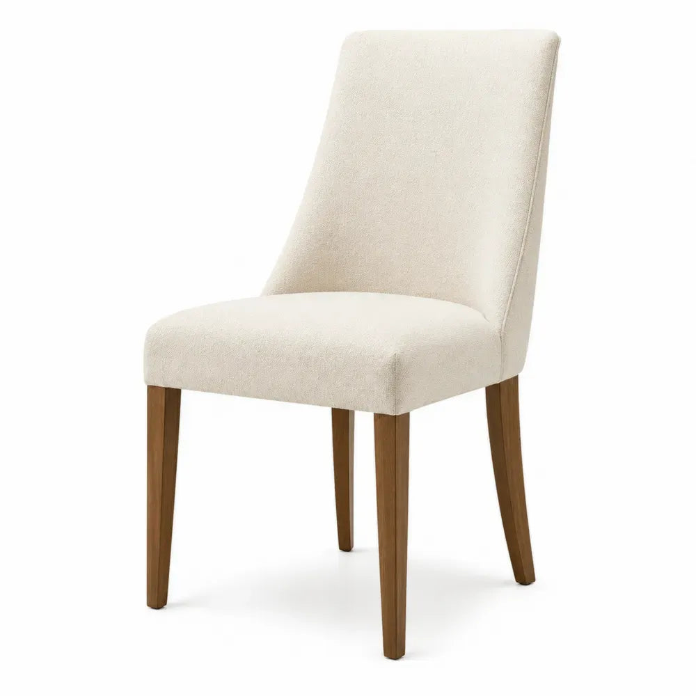 Silla de comedor tapizada en tejido beige patas de madera maciza diseño fijo sin dimensiones especificadas